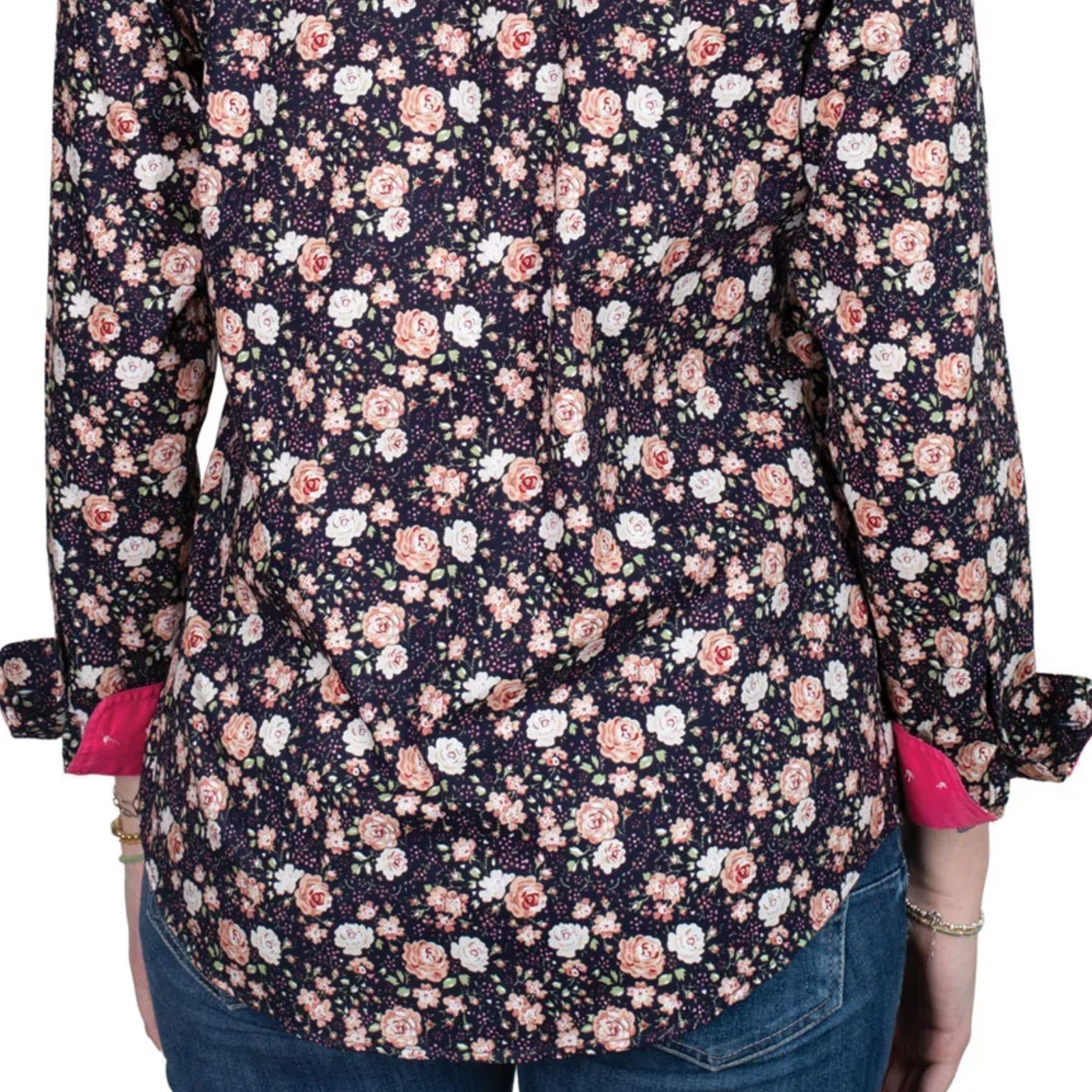 Floral patterned shirt with pink and white flowers on a dark background