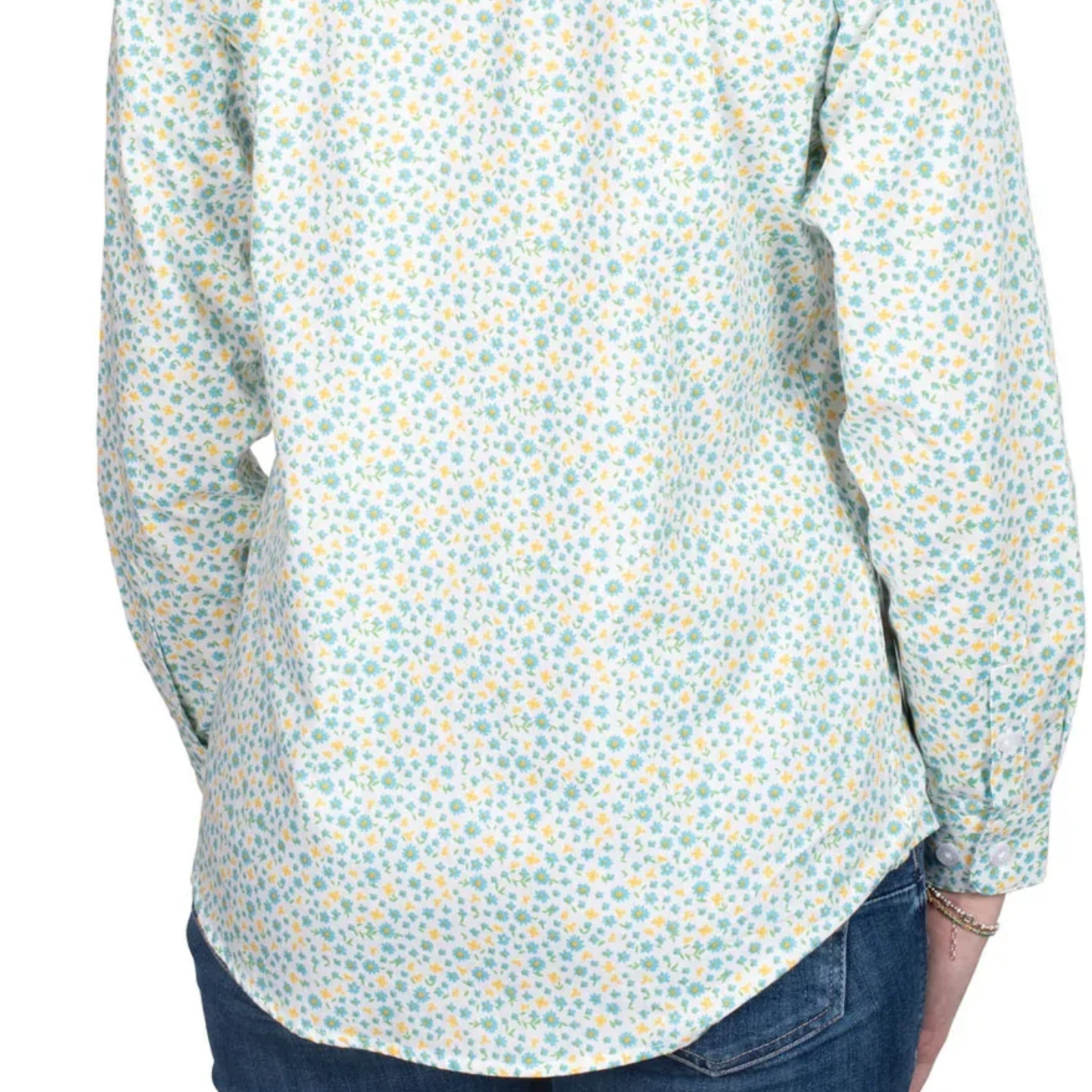 Floral patterned shirt worn by a person on a white background