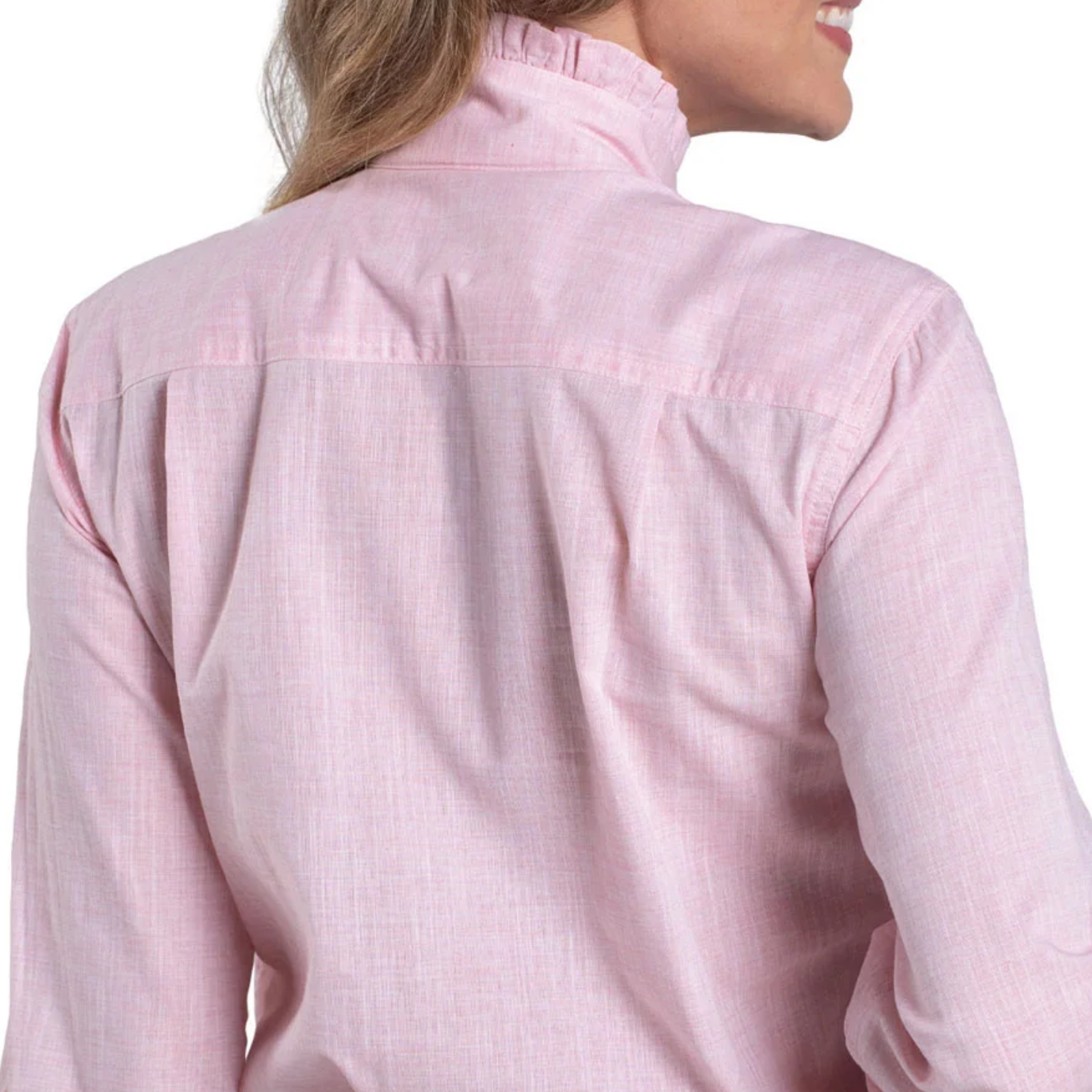 Close-up of a pink shirt worn by a person on a white background