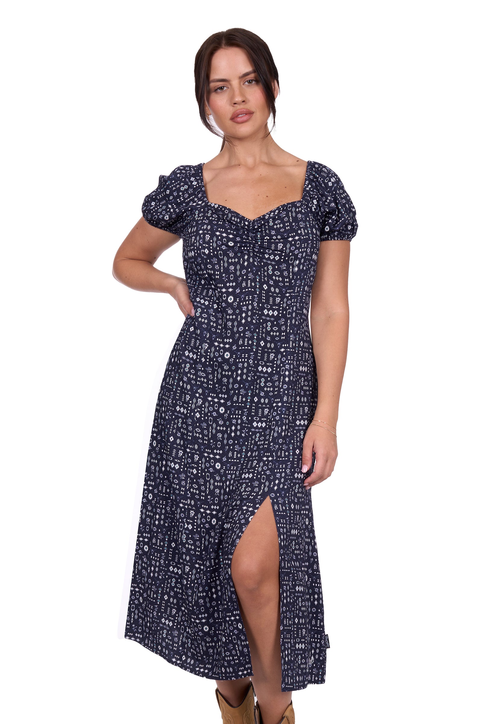 Wrangler Women's Beth Dress. Woman wearing a navy blue floral dress with a white background