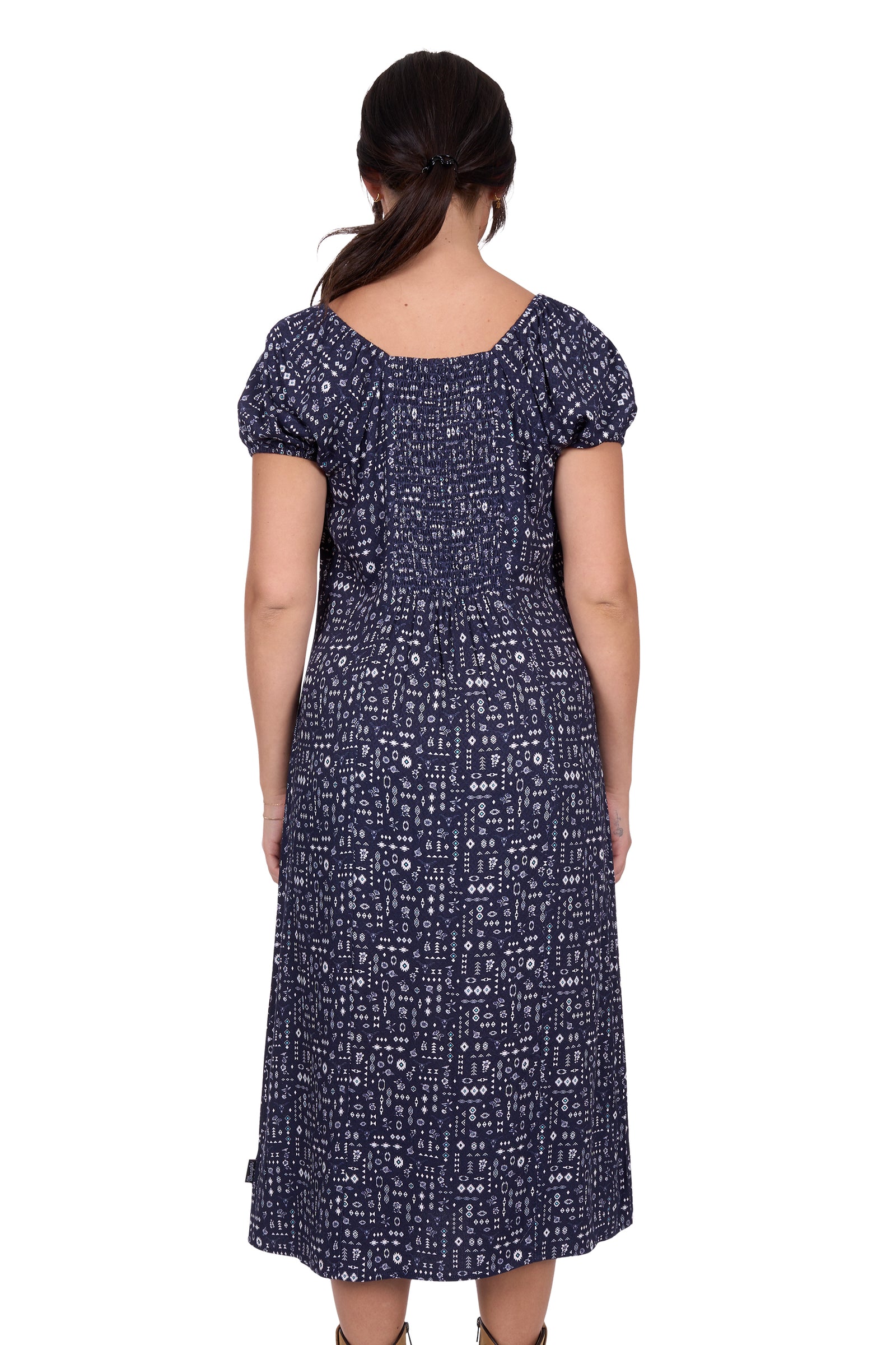 Wrangler Women's Beth Dress. Woman wearing a navy blue dress with white patterns on a white background
