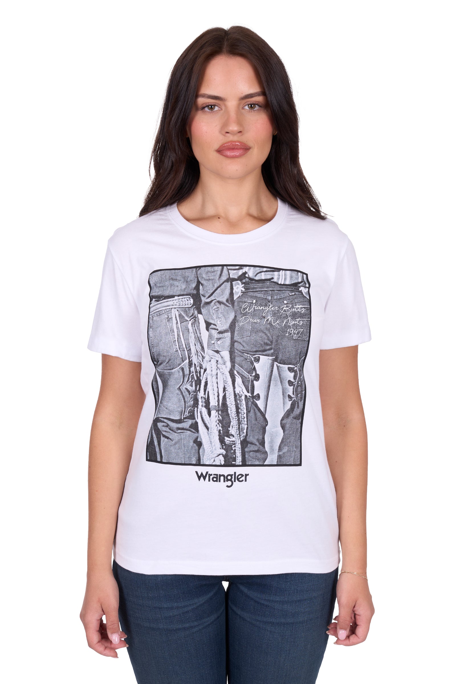 Wrangler Women's Julia S/S T-Shirt. Woman wearing a white t-shirt with graphic design and 'Wrangler' branding.