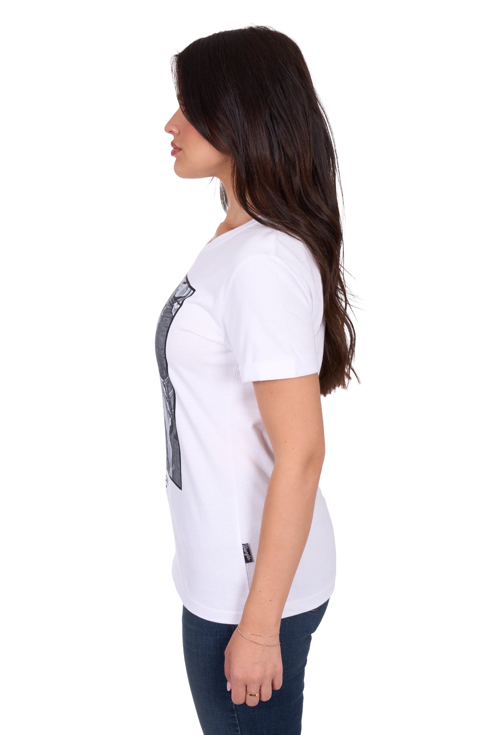 Wrangler Women's Julia S/S T-Shirt. Woman wearing a white t-shirt with a graphic design on a white background