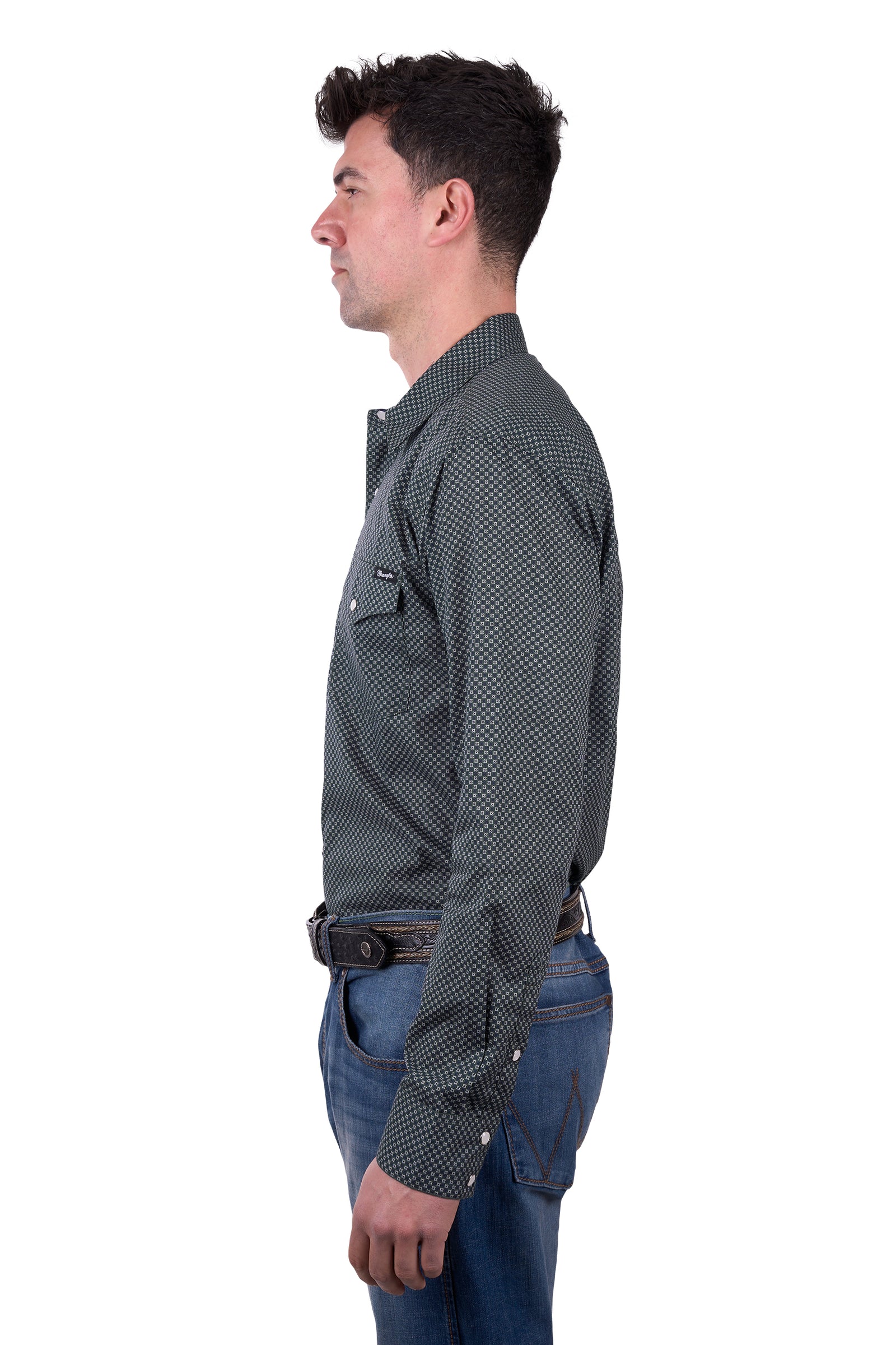 a man wearing a Wrangler Men's Steve L/S Western Shirt with denim jeans and a belt on a white background