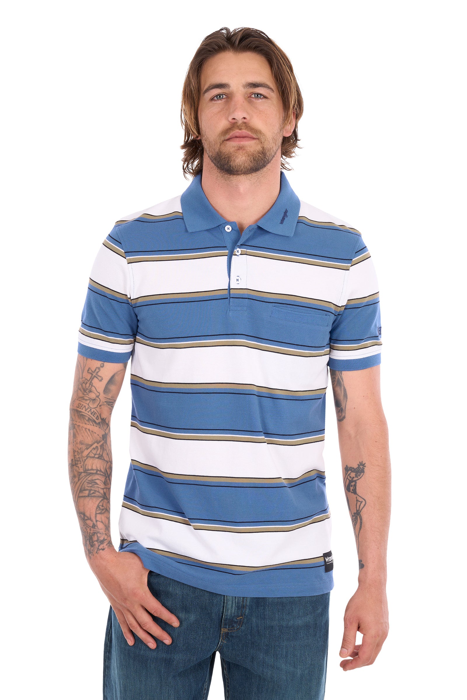 A man wearing a blue and white striped short-sleeve polo shirt with thin tan stripes, paired with blue jeans, against a plain white background.
