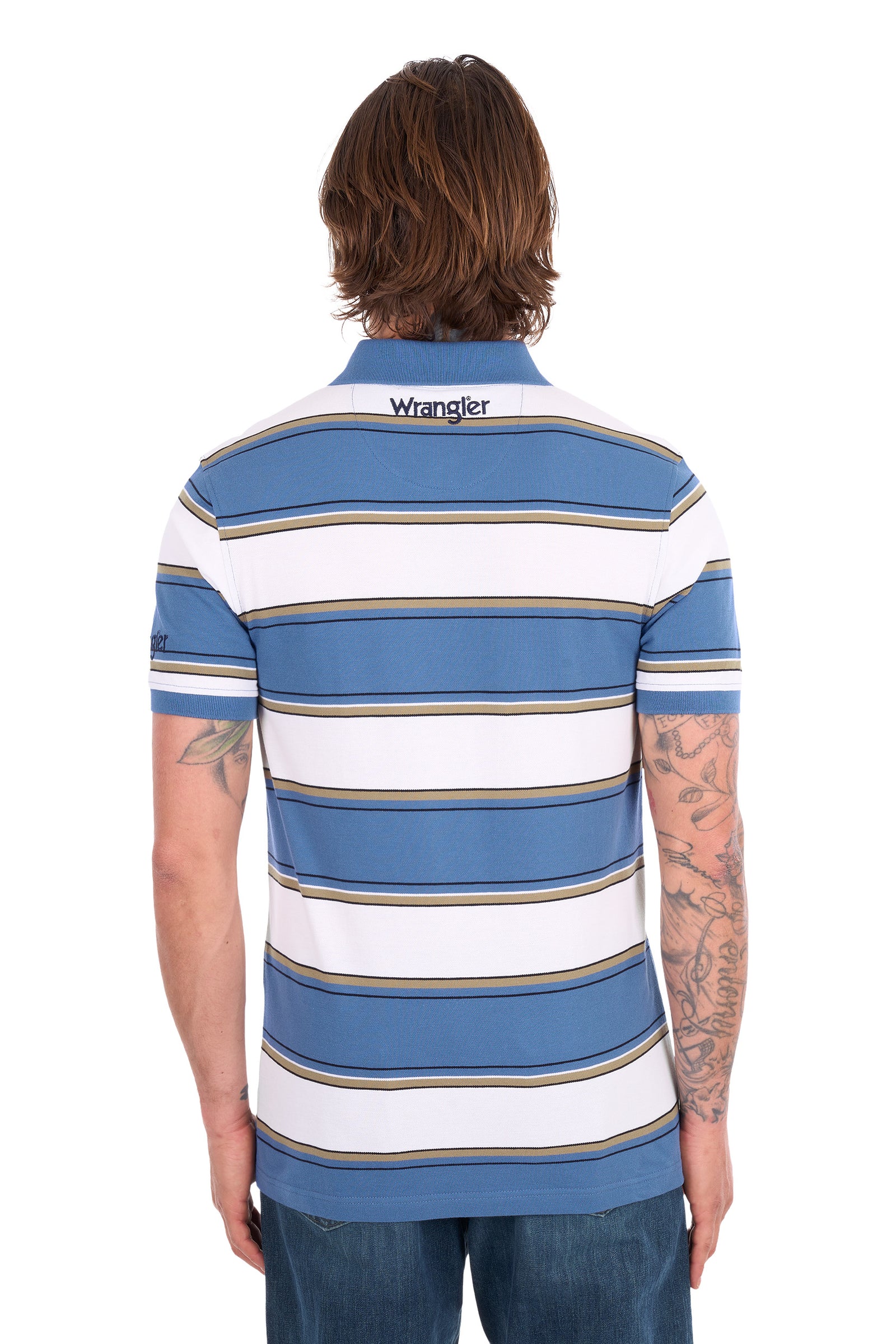 A man viewed from the back wearing a Wrangler short-sleeve polo shirt with horizontal blue, white, and tan stripes, paired with blue jeans against a white background.
