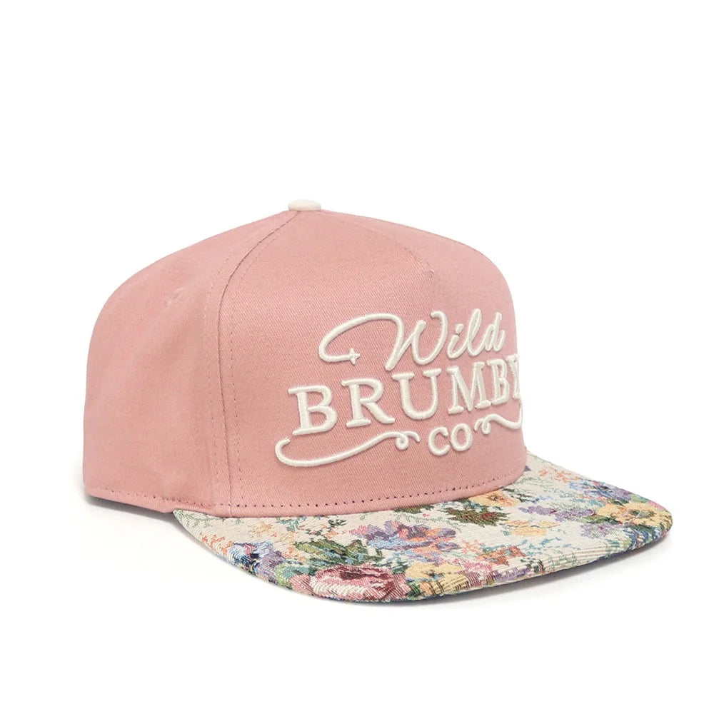 Pink cap with floral brim and 'Wild Brumbies Co' text on a white background