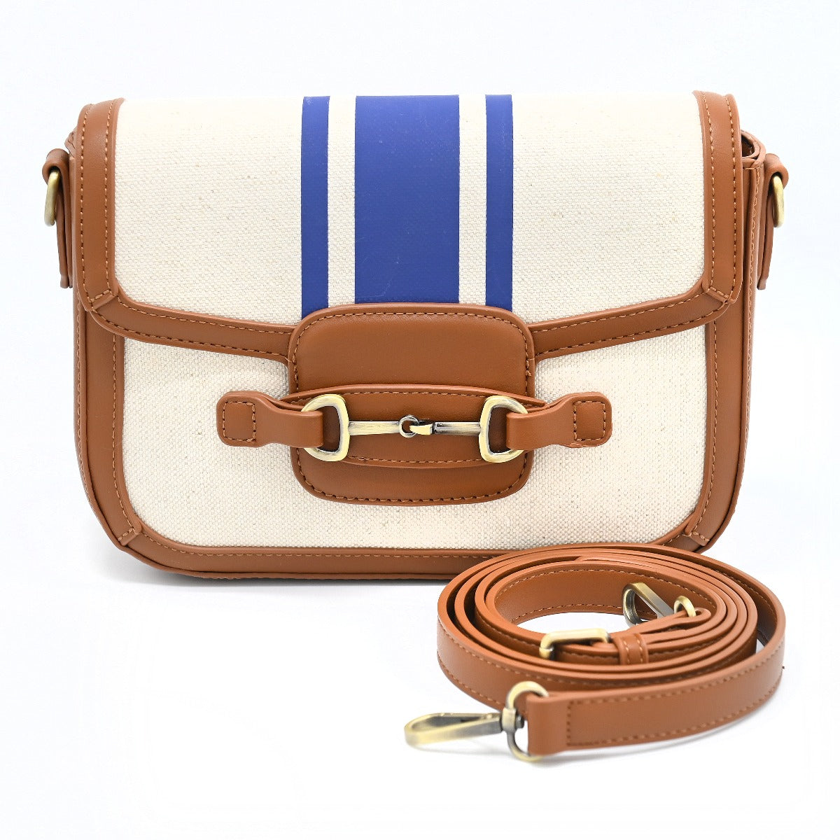 Bahamas Purse Clutch-Canvas. Crossbody bag with white body, blue stripes, and brown leather accents on a white background