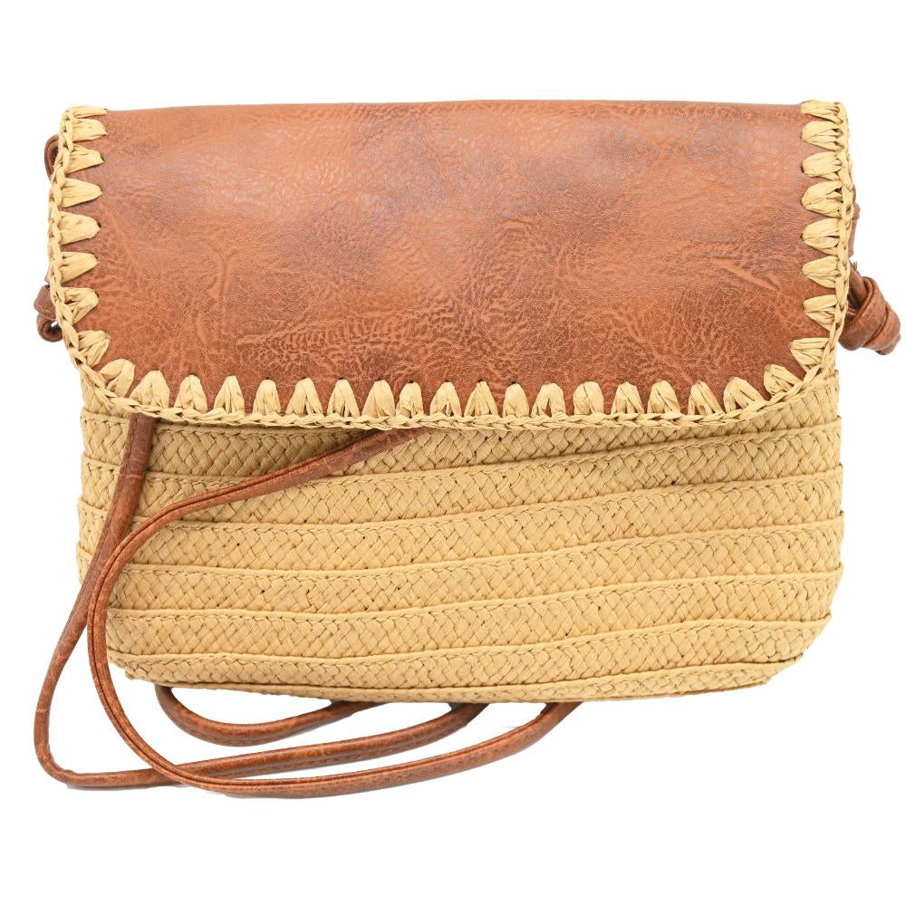 A rectangular shoulder bag with a brown leather flap and a natural beige woven straw body, featuring a decorative braided trim along the edge of the flap and a thin brown leather strap.