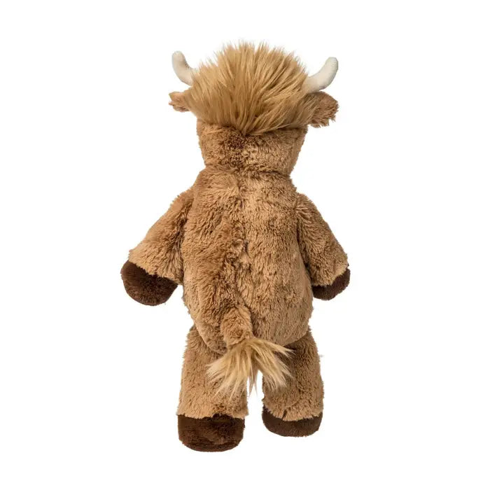 Plush toy of a brown yak with a white background