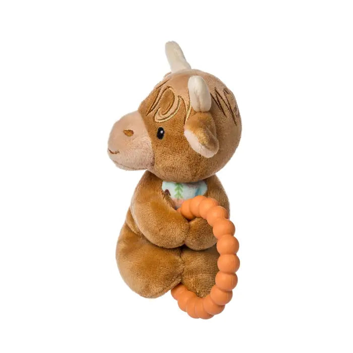 Plush dinosaur toy with an orange ring on a white background