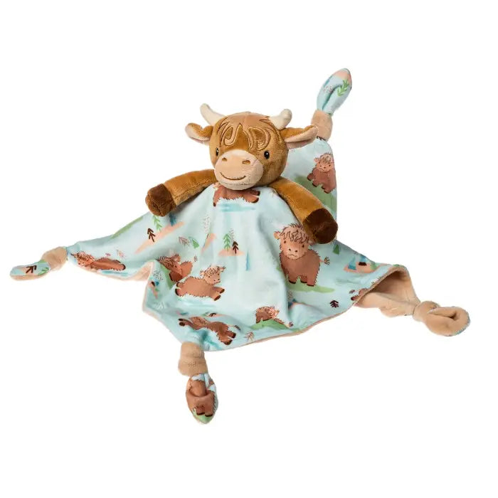 Plush toy with a cow design on a white background