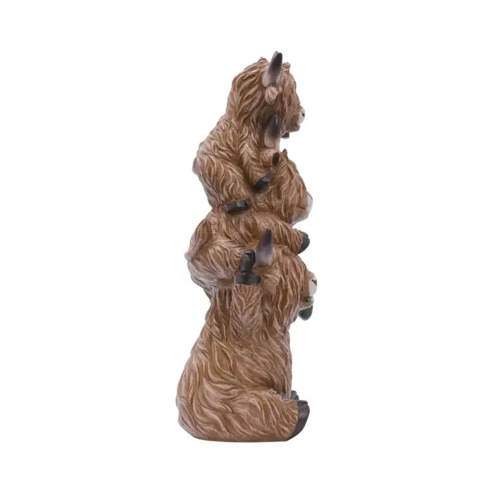 A small figurine of three stacked bears, with detailed brown fur and dark claws, shown against a plain white background.