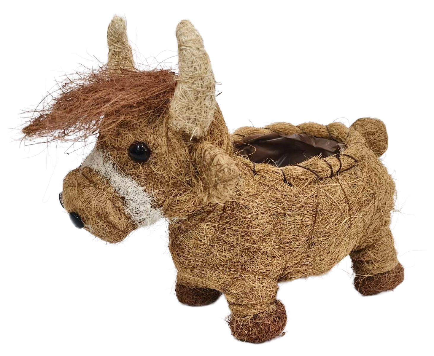 A rustic, cow-shaped decorative container or planter made from natural coir rope, featuring a brown and white painted face, upright horns, and a dark brown interior lining, shown on a plain white background.