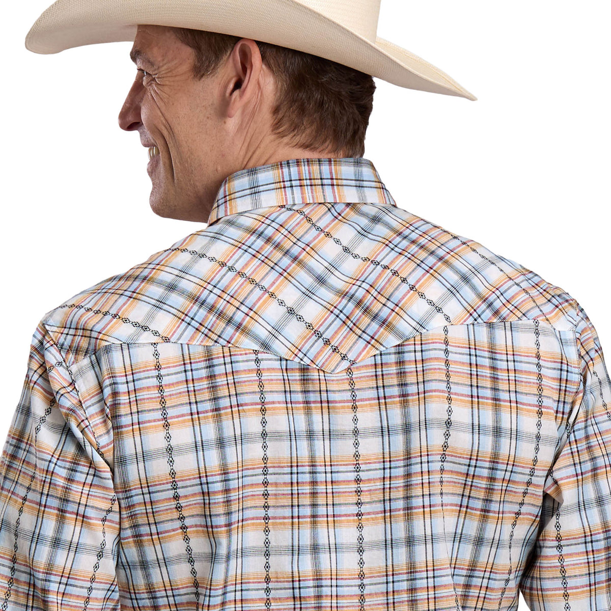 Man wearing a plaid shirt and cowboy hat on a white background