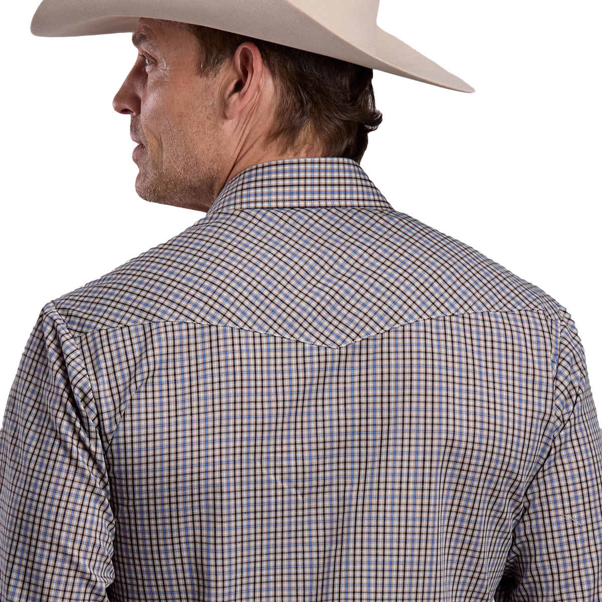 Man wearing a plaid shirt and cowboy hat on a white background