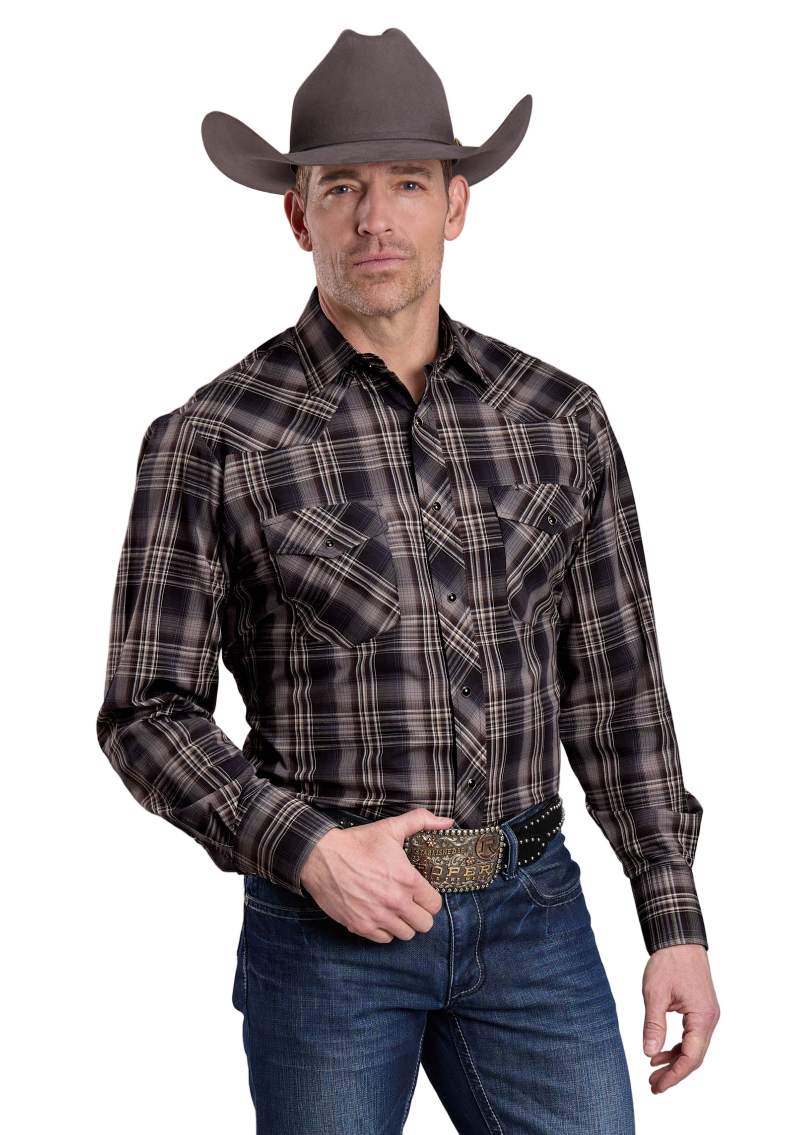 Roper Men's Karman Classic L/S Western Shirt. Man wearing a plaid shirt, jeans, and a cowboy hat on a gray background