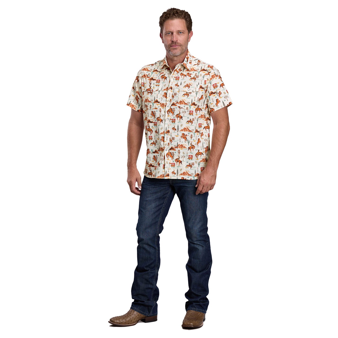 Man wearing a patterned shirt and jeans on a white background