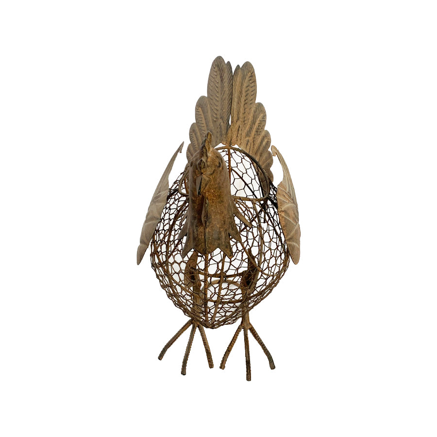 Decorative Chook Egg Basket. Decorative metal rooster sculpture on a white background