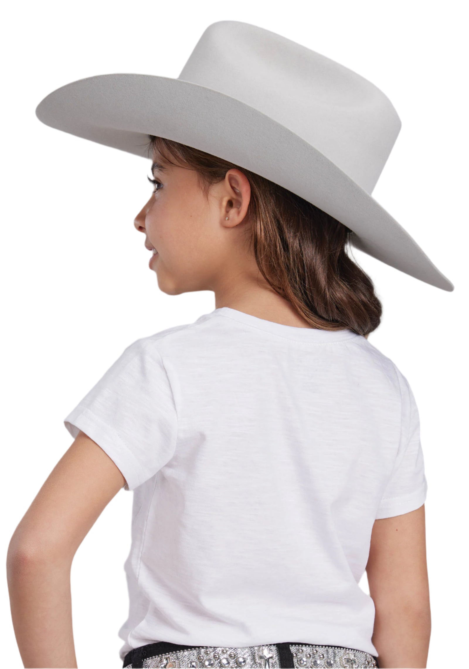 Roper Girl's Horse Print Five Star Tee. A girl wearing a white t-shirt with a horse graphic, a grey cowboy hat, and black pants, standing against a white background.