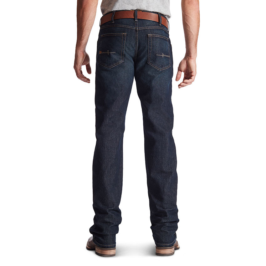 A man wearing a pair of Ariat Men's Rebar M5 Slim Straight Leg Jeans.