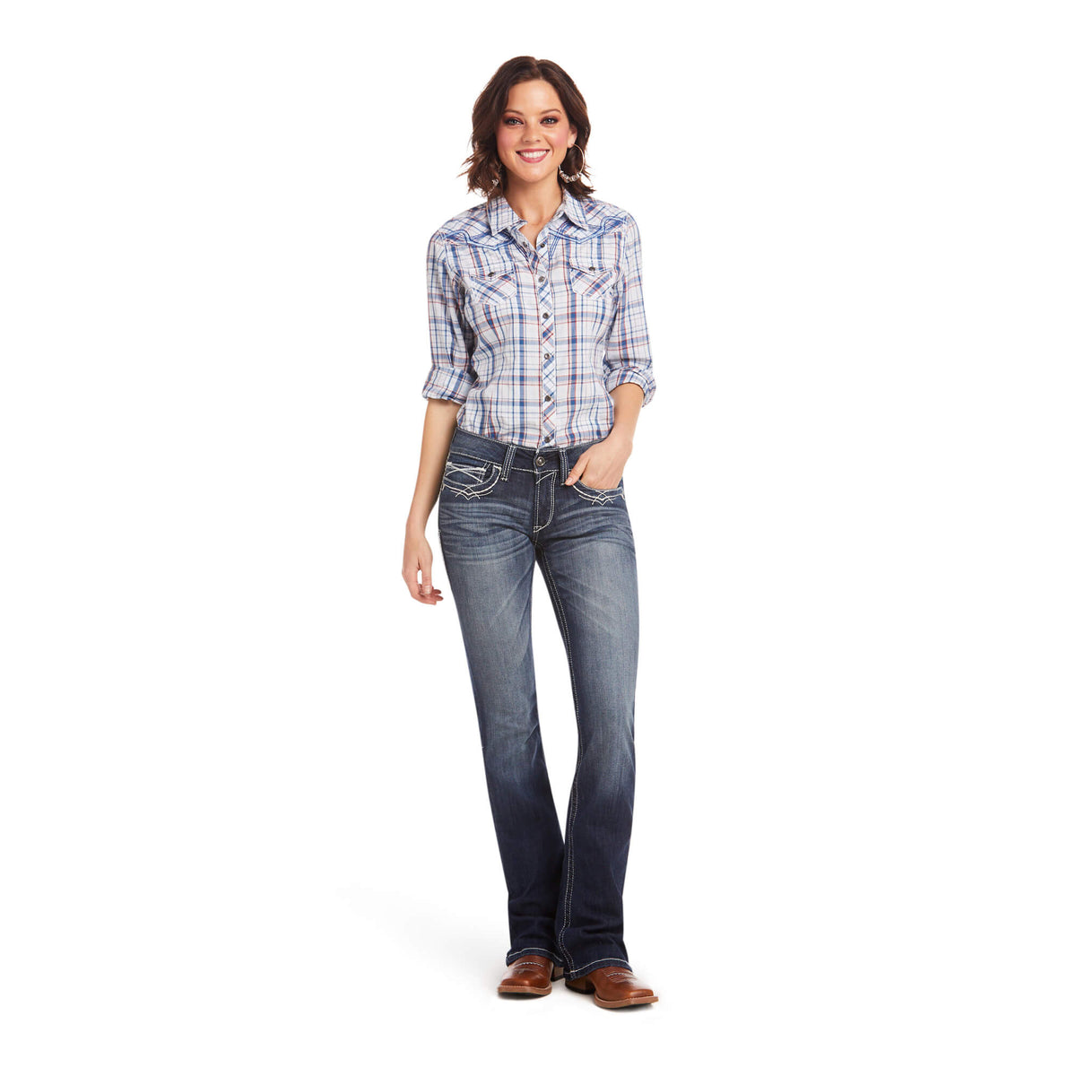 Ariat Women's Real Mid Rise Boot Cut Jean. Person wearing a plaid shirt and jeans on a white background
