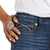Ariat Women's Rosa Perfect Rise Boot Cut Jean. Close-up of a hand wearing a silver ring on blue jeans with a white background