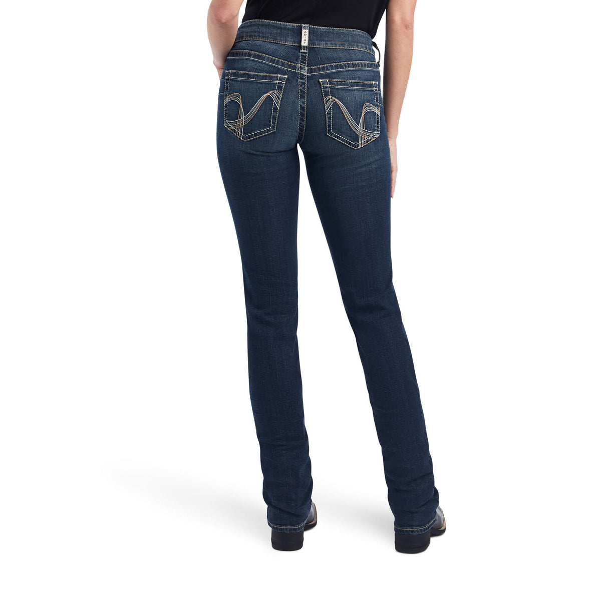 Ariat Women's Freesia Straight Leg Jean. Person wearing blue jeans on a white background