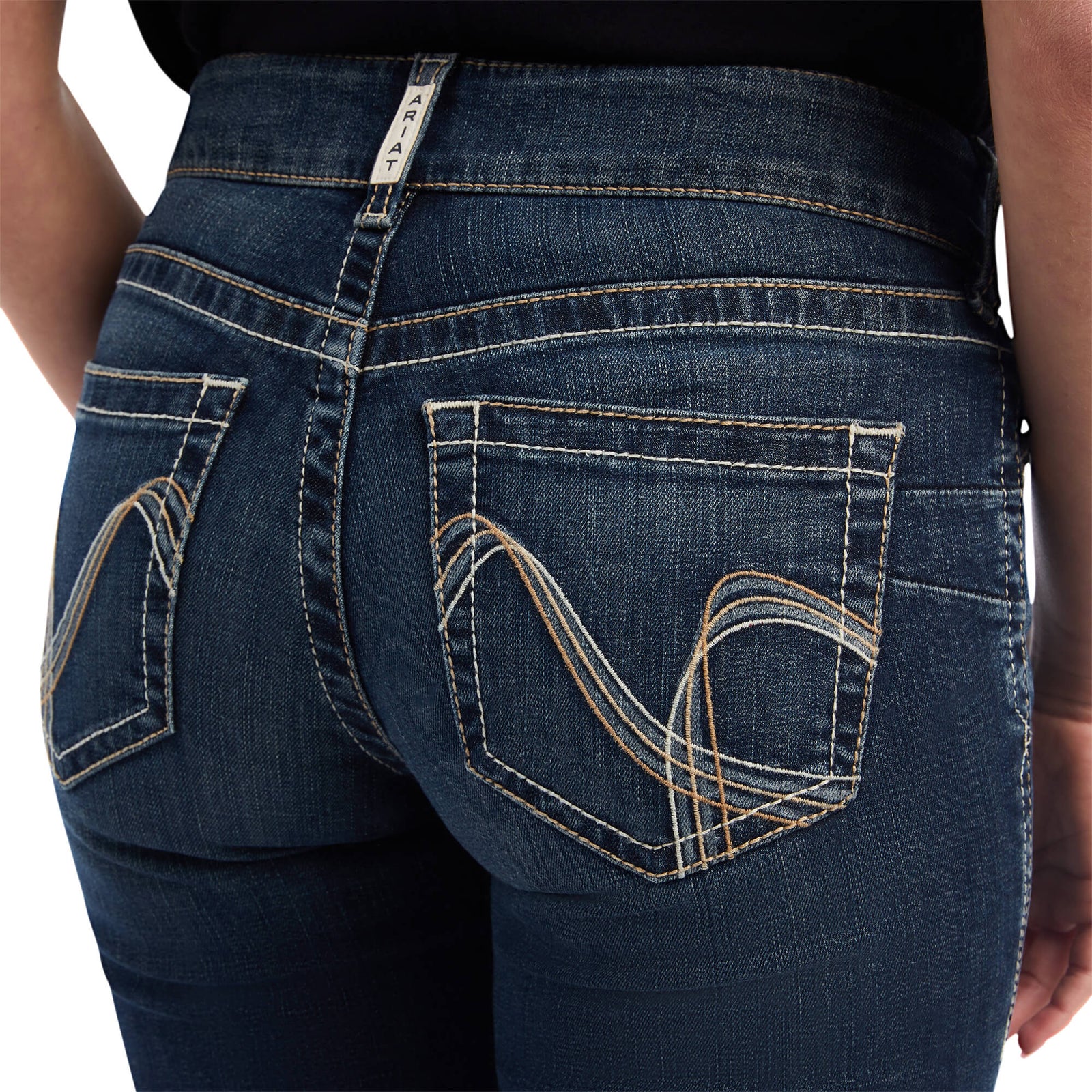 Ariat Women's Freesia Straight Leg Jean. Close-up of blue jeans back pocket design.