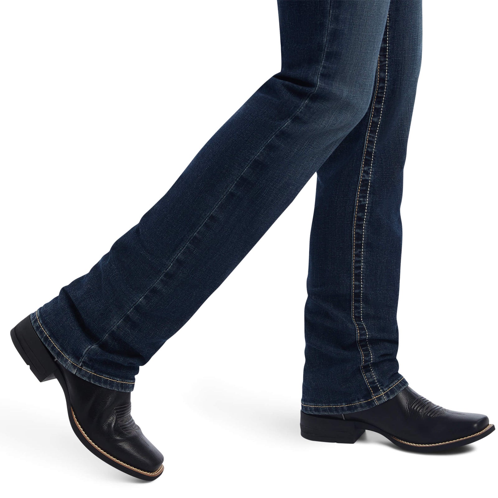 Ariat Women's Freesia Straight Leg Jean. Dark blue jeans and black boots on a white background