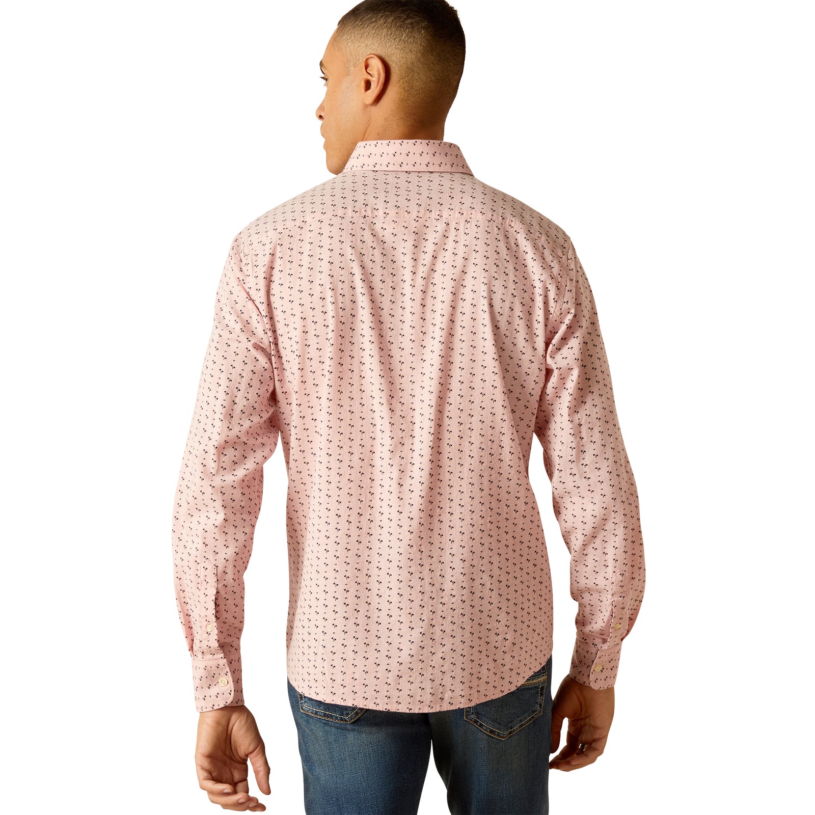 Ariat Men's Marshall Modern L/S Western Shirt. A man wearing a long-sleeved, pink, geometric patterned, western shirt with a hidden button-down collar and contrasting elbow patches.