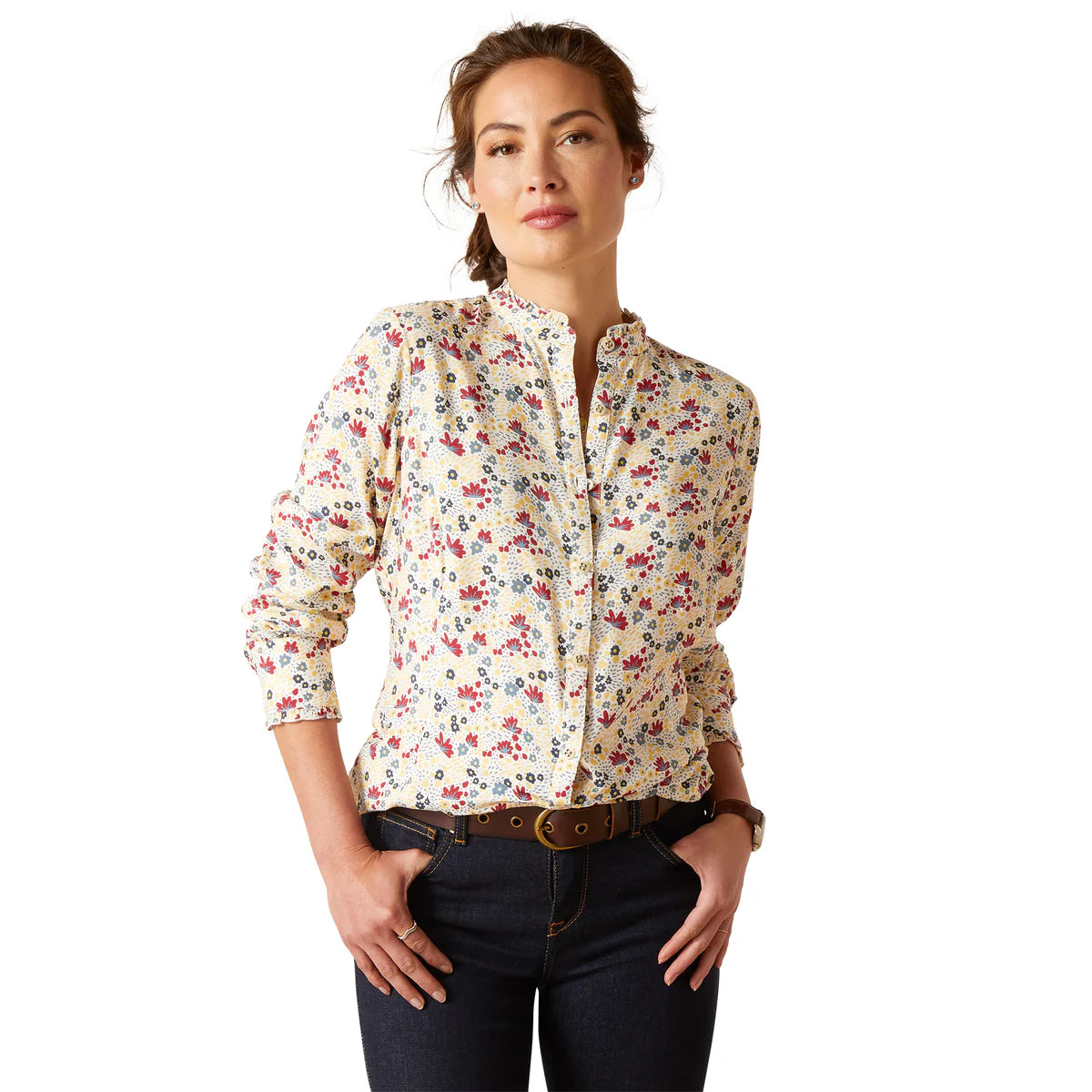 Ariat Women's Clarion L/S Blouse. A woman wearing a long-sleeved, floral print, silky twill blouse with a mock neckline.
