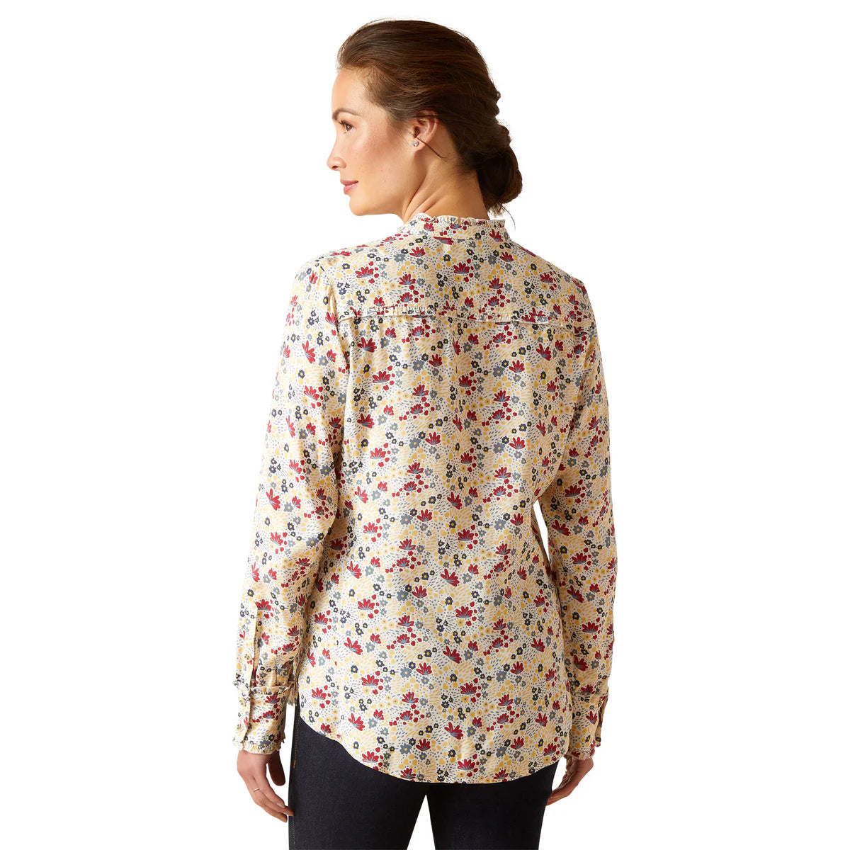 Ariat Women's Clarion L/S Blouse. A woman wearing a long-sleeved, floral print, silky twill blouse with a mock neckline.
