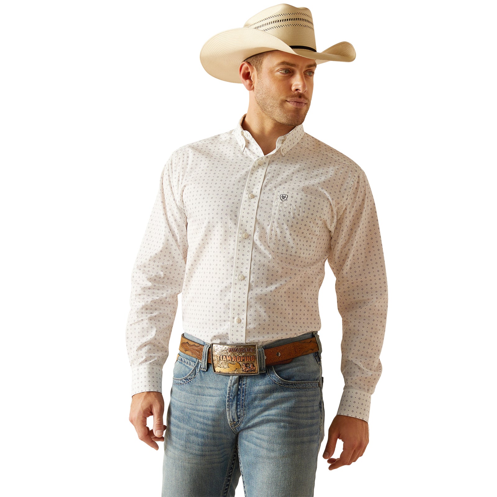 Ariat Men's Ogden Wrinkle Free L/S Western Shirt. A man wearing a long-sleeved, wrinkle-free, white and blue checkered western shirt with a contrast collar band and cuffs, paired with blue jeans and a western-style belt.