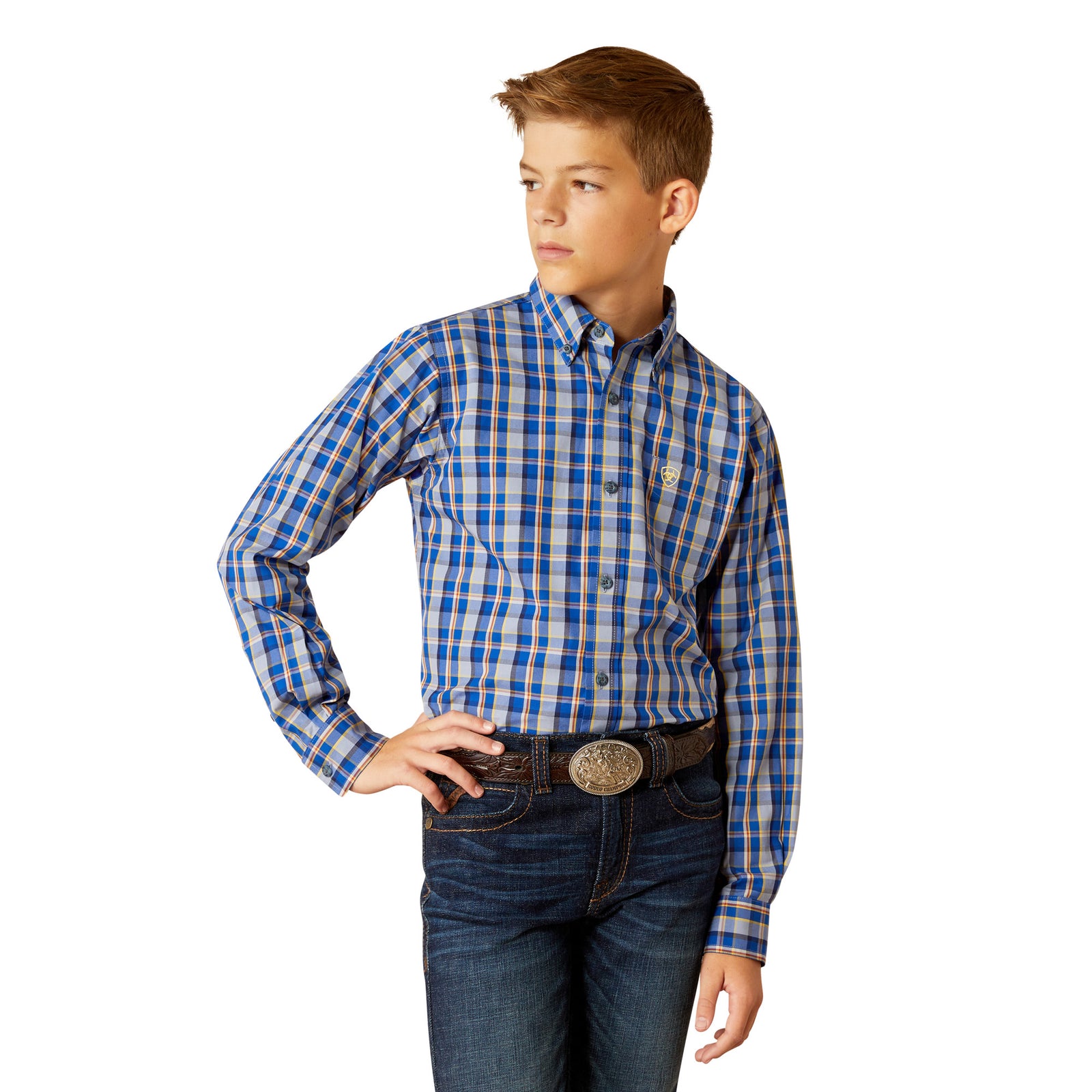 Ariat Boy's Reggie Pro L/S Western Shirt. A boy wearing a blue and white plaid long-sleeved Western shirt with buttoned collar points and a left chest pocket.