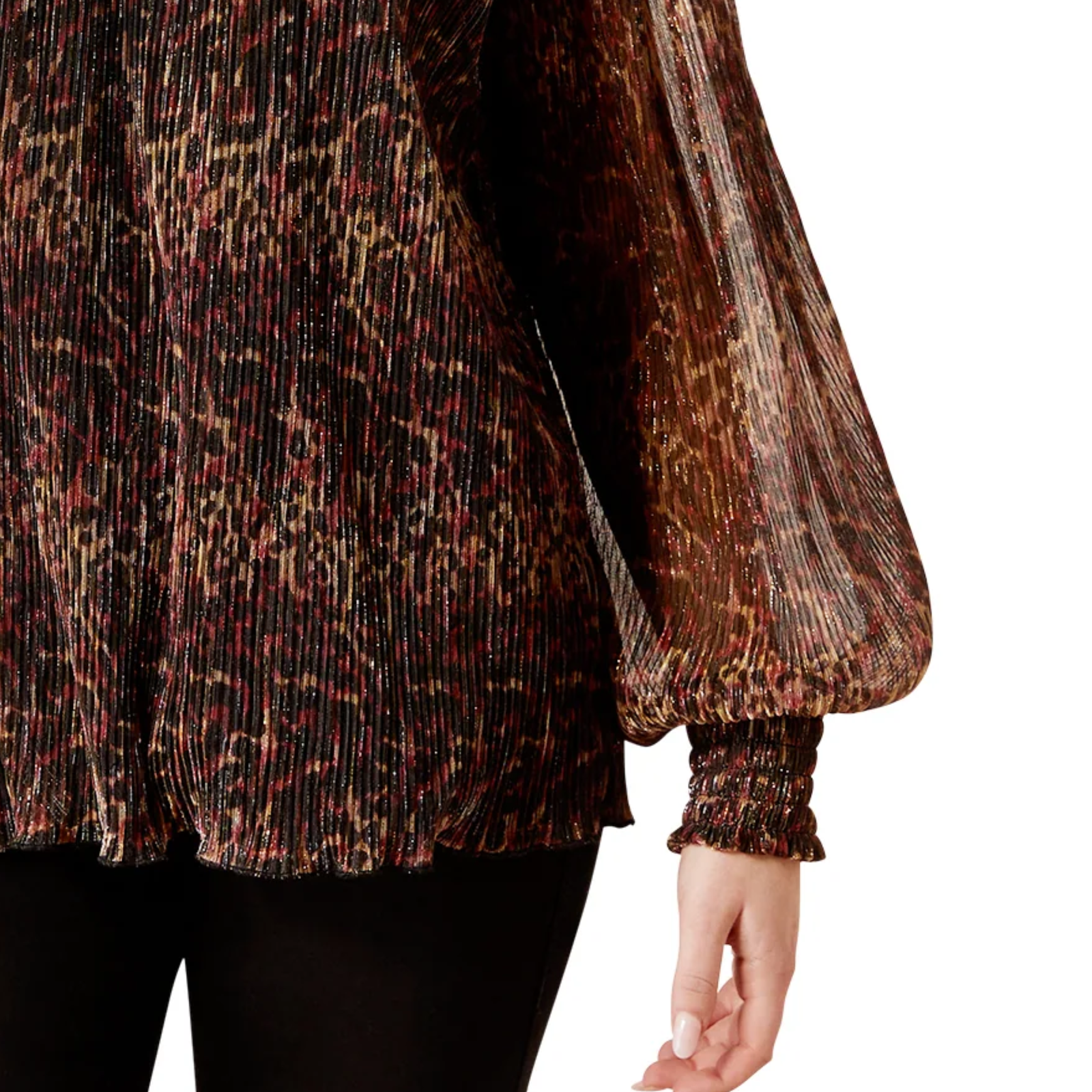 Close-up of a patterned sweater with a blurred background