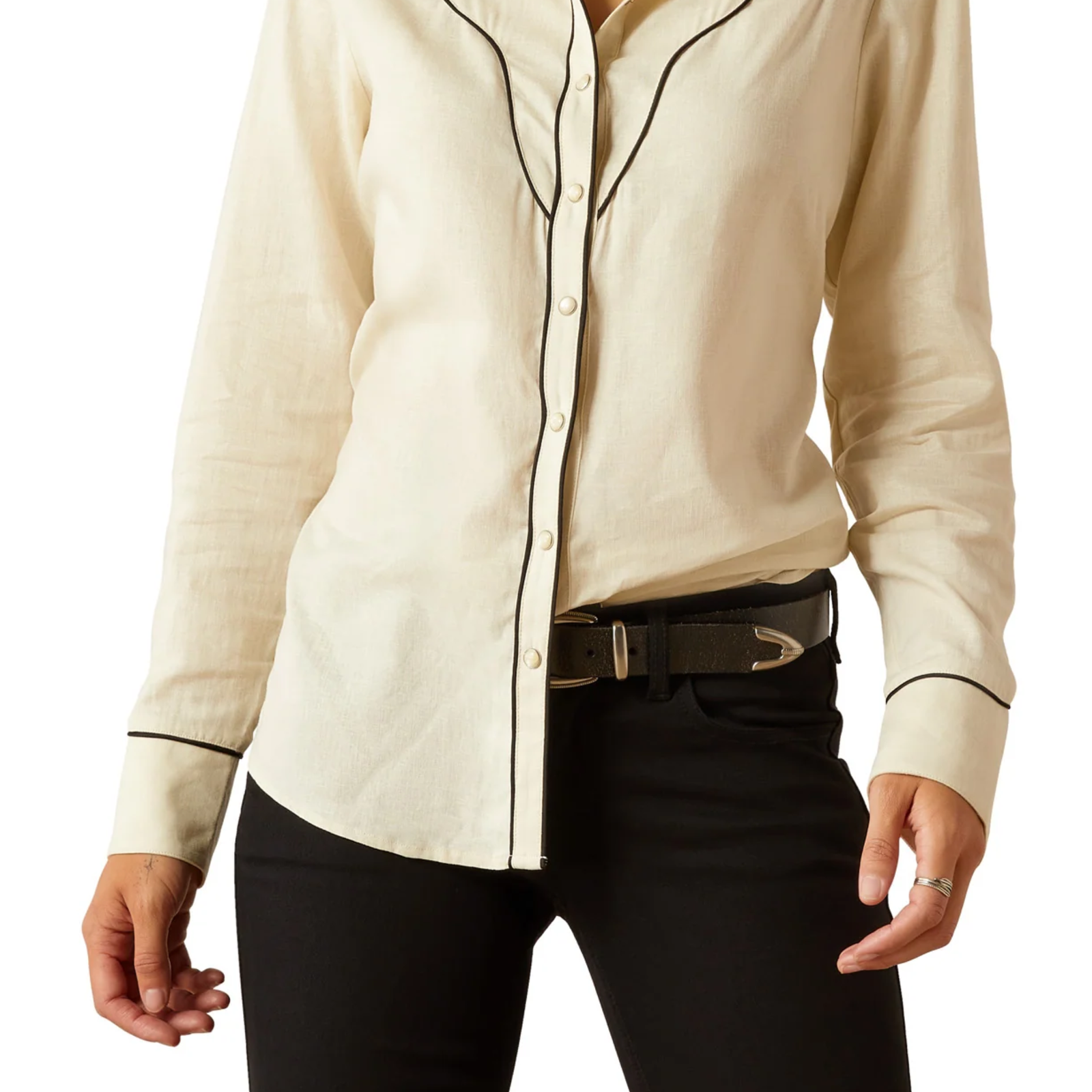 Beige button-up shirt with black trim worn by a person on a white background