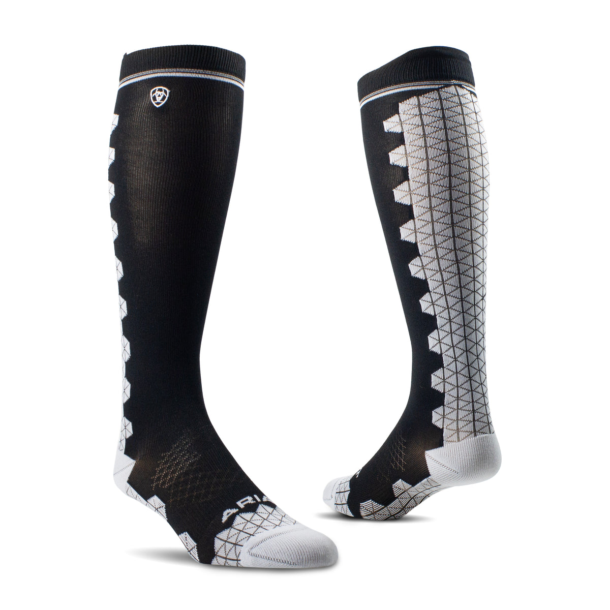 AriatTek Devon Performance Tall Boot Socks. Two black knee-high socks with white patterns on a white background