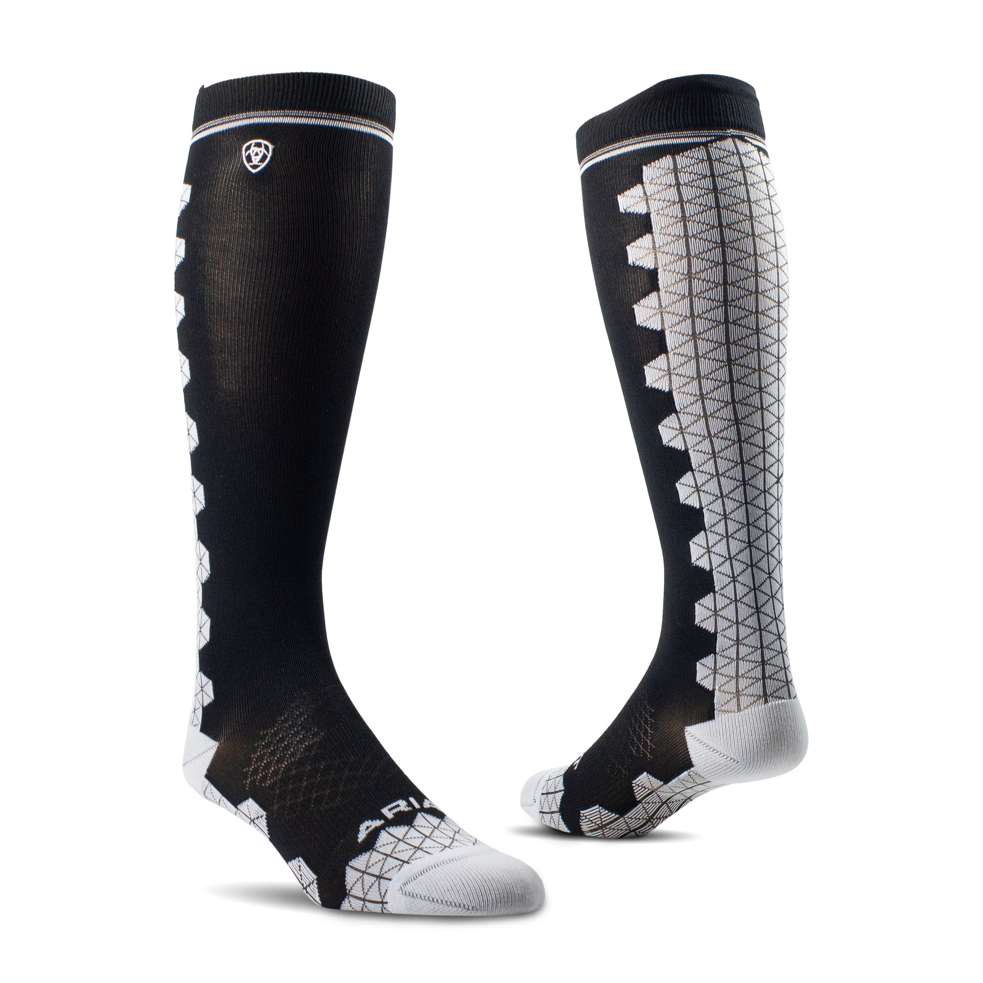AriatTek Devon Performance Tall Boot Socks. Two black knee-high socks with white patterns on a white background
