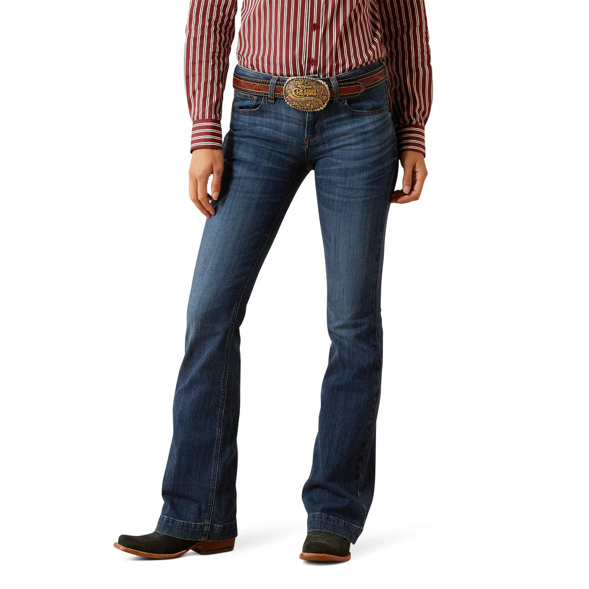 Person wearing blue jeans with a red and white striped shirt on a white background