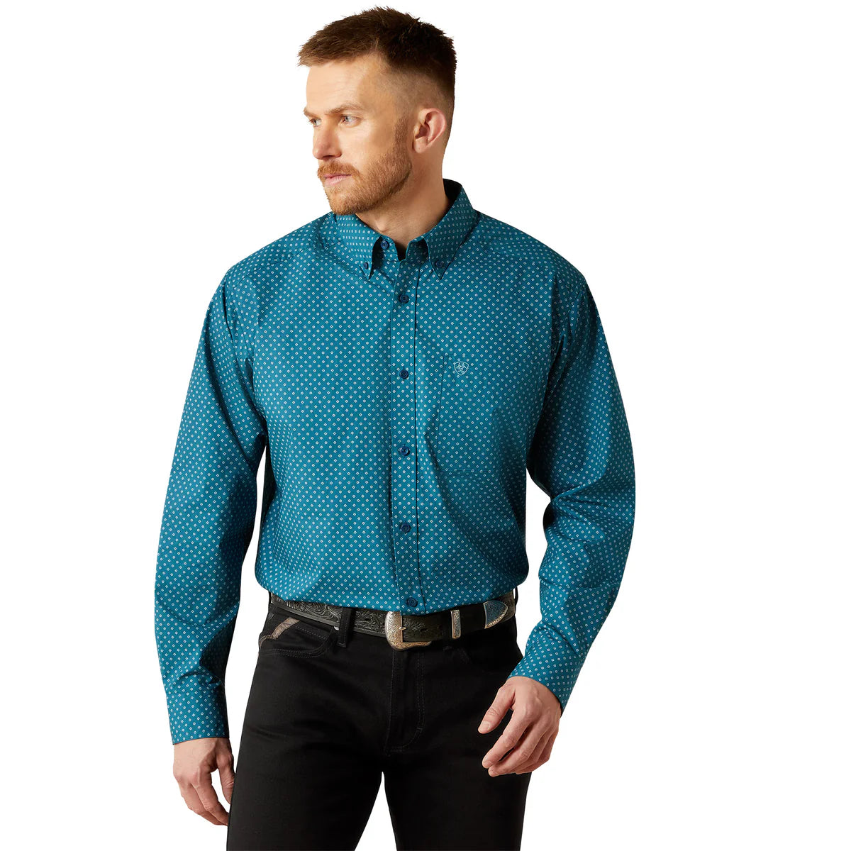 Man wearing a blue patterned shirt on a white background