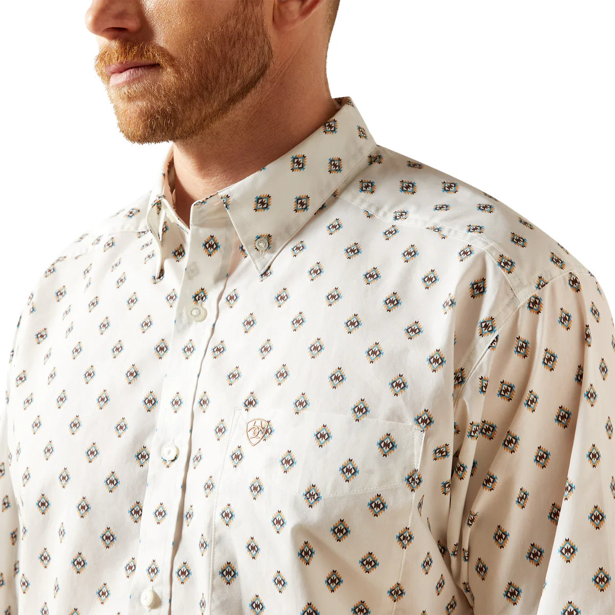 Man wearing a white patterned shirt on a white background