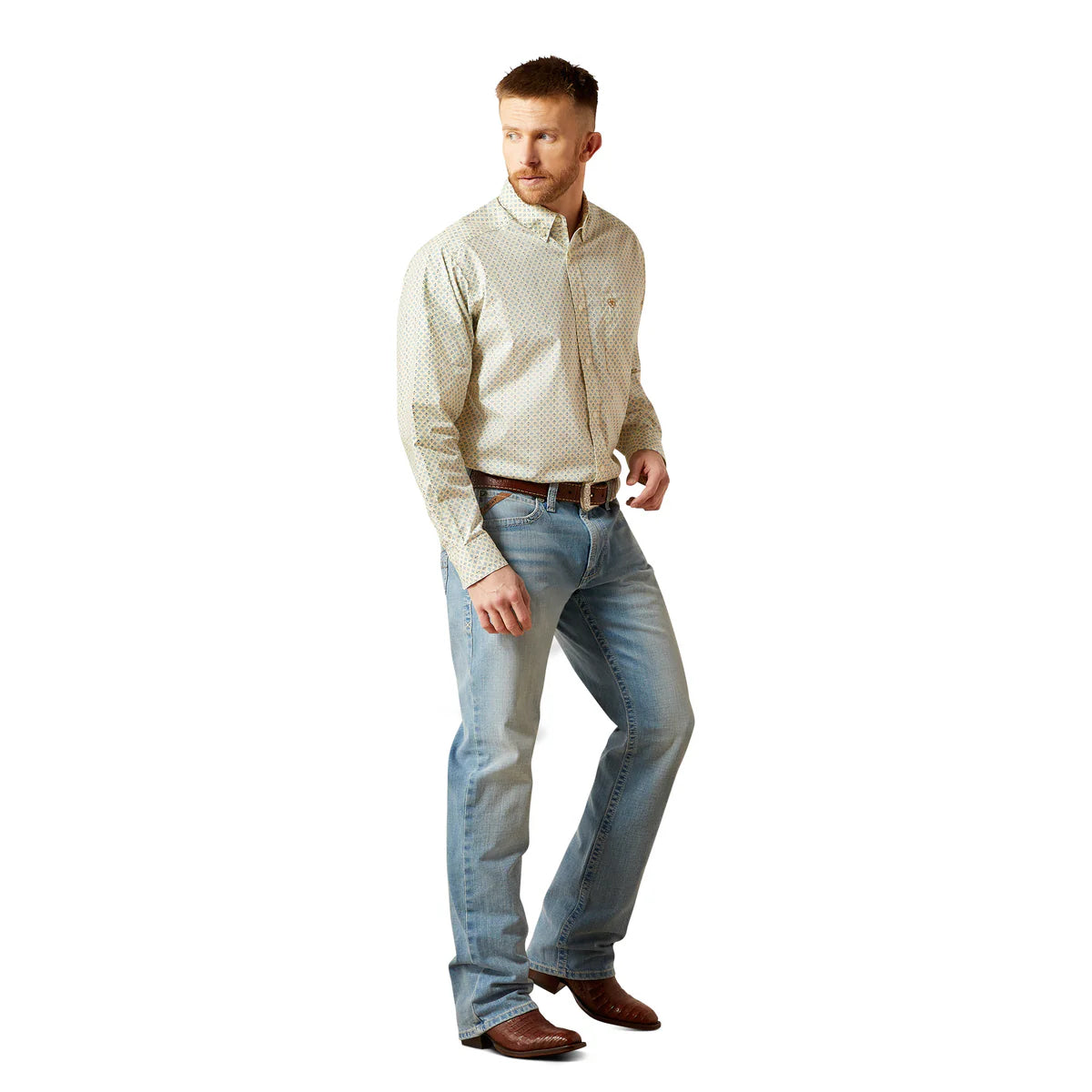Man wearing a light-colored shirt and jeans on a white background