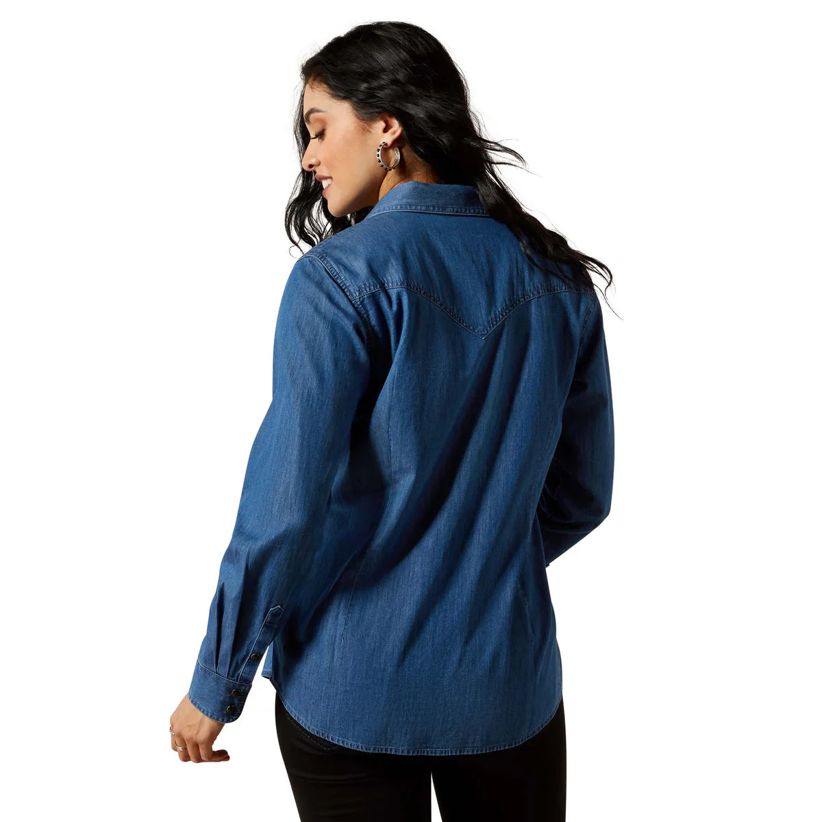 Woman wearing a blue denim shirt on a white background