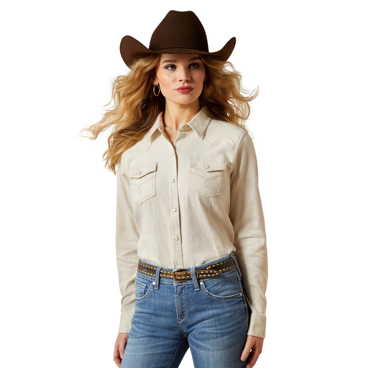Woman wearing a beige shirt, blue jeans, and a brown cowboy hat on a white background