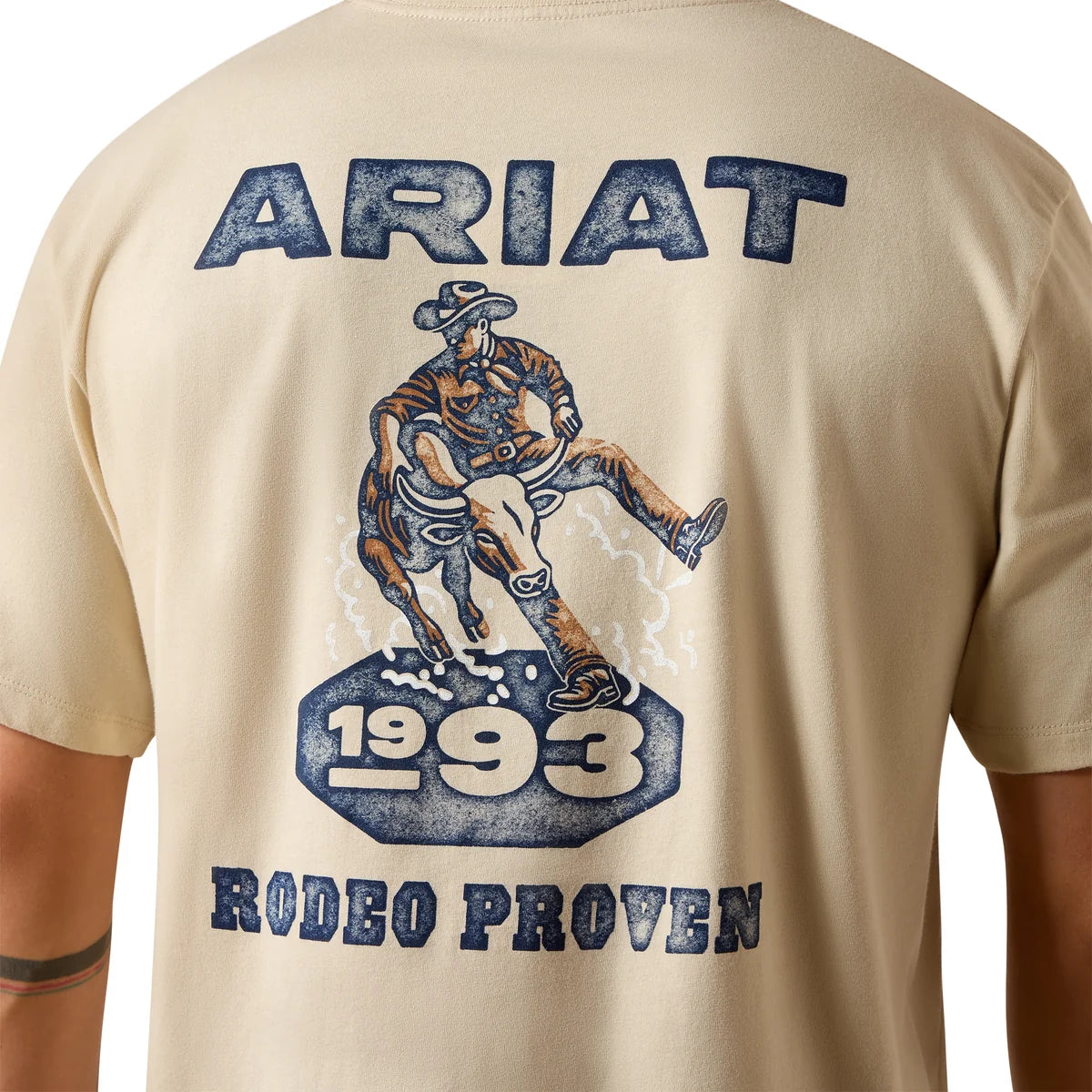 Beige t-shirt with Ariat logo and cowboy graphic on the back