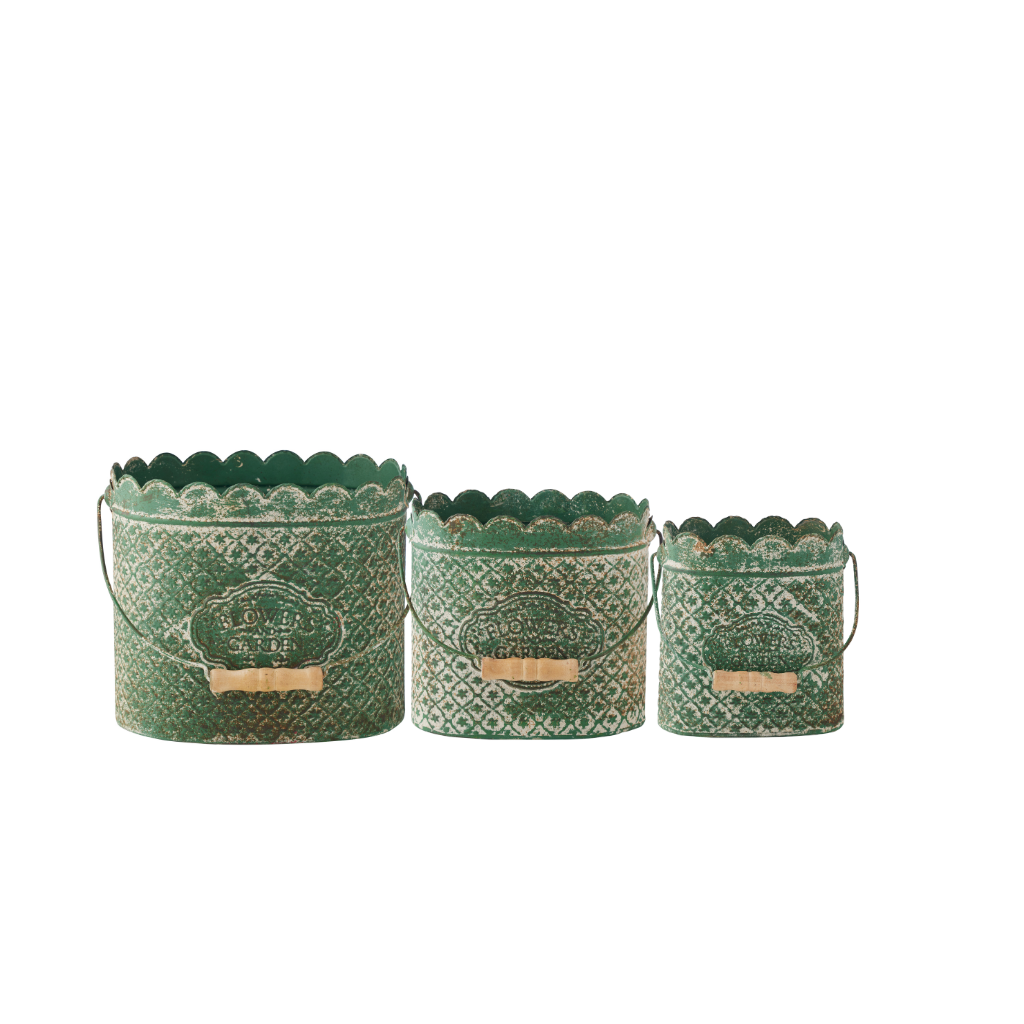Set of three green patterned metal buckets on a white background