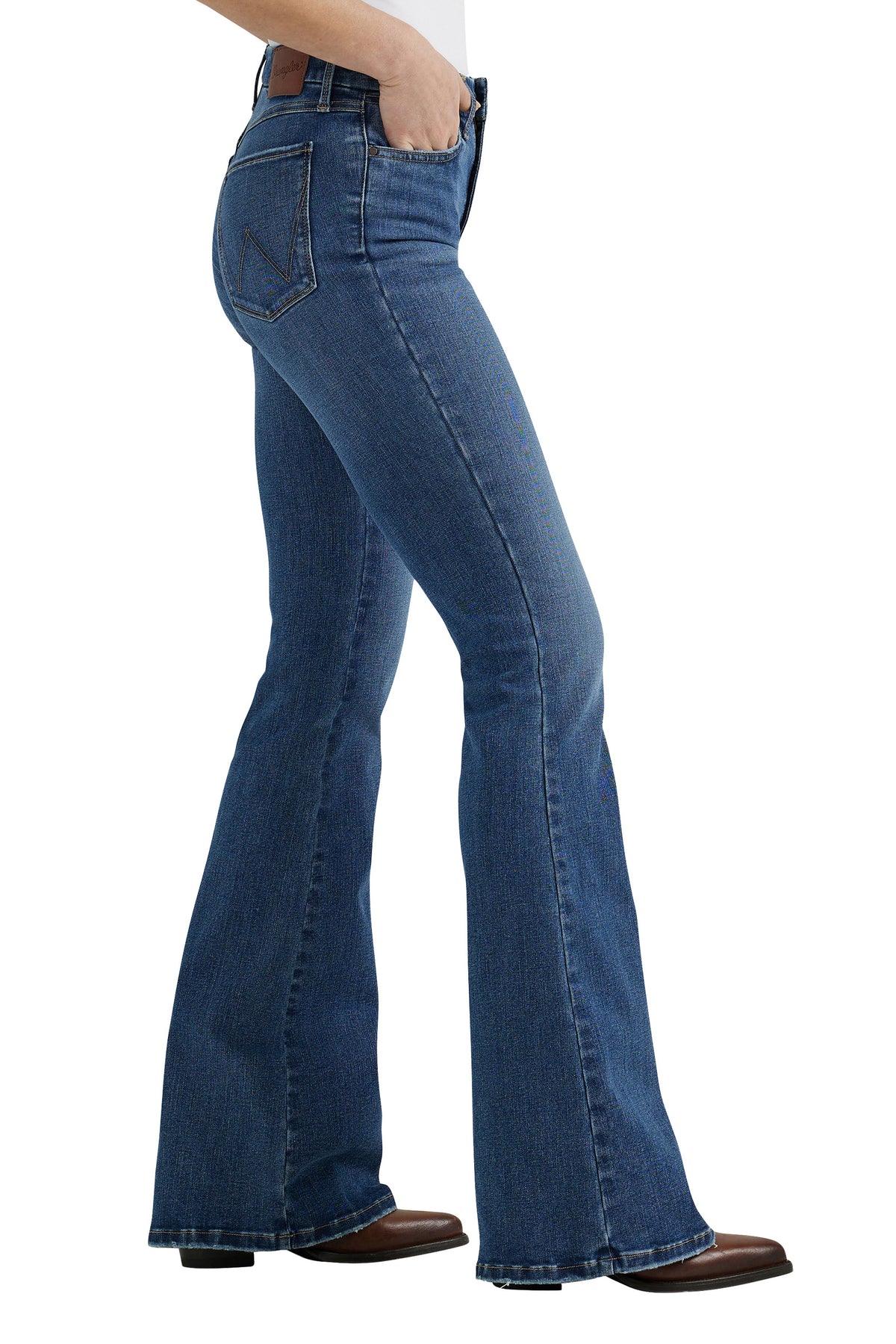 Wrangler Women's Bespoke High Rise Flare Jean. Blue jeans worn by a person on a white background