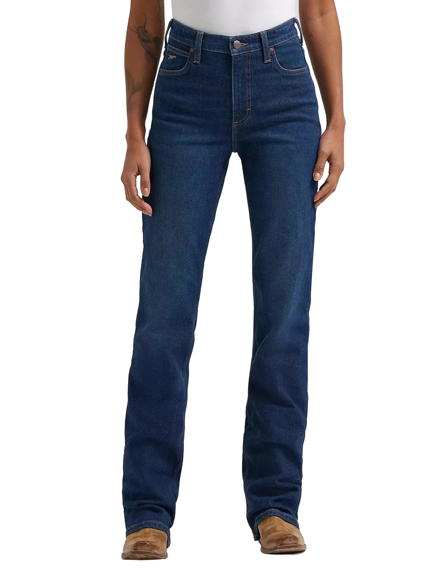 Person wearing blue jeans on a plain background