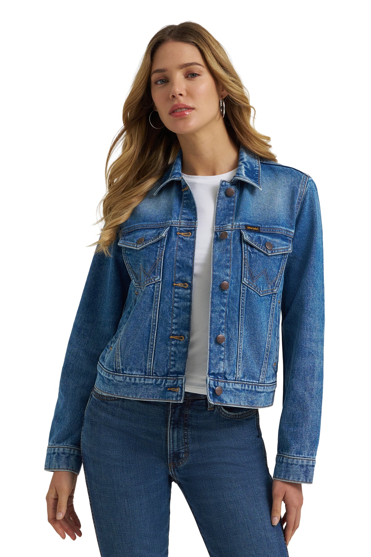Woman wearing a blue denim jacket on a white background